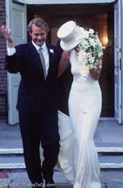 A bride and groom leaving church; Size=180 pixels wide